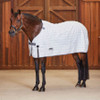 Versatile layer system ensures you can remove or add a layer to ensure your horse is comfortable whatever the weather. The WeatherBeeta ComFiTec Cotton Sheet Liner enables versatility for compatible WeatherBeeta rugs, it will provide your horse warmth without the fill, making it ideal for damp horses, as well as being easy to wash. Offering a 60% cotton outer with lined shoulders to prevent rubbing and boa fleece wither relief, gussets are compatible with both the freedom system and traditional side gussets, with a single touch tape front chest strap and 2 touch tape tabs on the neck and clips at the rear to allow for an easy optional layer. Compatible with WeatherBeeta ComFiTec Ultra Cozi II, Ultra Tough II, Premier Free II, Plus Dynamic II and PP Channel Quilt II.