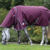 Comfortable, durable, remarkable value. The WeatherBeeta ComFiTec Plus Dynamic II Detach-A-Neck Medium/Lite comes packed with great features, including a super strong and durable 1200 denier triple weave outer shell with repel shell coating that is both waterproof and breathable, memory foam wither relief pad that contours to the horse's shape and lifts the rug off the wither to reduce rubbing and provide added comfort, quick clip front closure offering maximum adjustability and is compatible with the WeatherBeeta liner system. This rug also offers 100g of polyfill which is easily identified with the WeatherBeeta temperature gauge badge, also featuring a NEW extra large tail flap for maximum protection, reflective strips on front each side and tail flap for extra visibility, traditional side gussets for natural movement, twin low cross surcingles and elasticated, adjustable and removable leg straps for a secure and comfortable fit. Hydrostatic Pressure Tested to 2000mm plus.