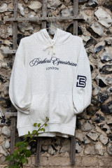 Step up your casual wardrobe with our Luxury Script Hoody, where sophistication intertwines with supreme comfort. This isn’t just any hoody; it’s a statement piece crafted for those who value quality and style.

Luxurious Details
Embroidered Logo: Adorning the chest is an intricately embroidered logo, symbolizing exclusivity and attention to detail.
Plush Lining: The interior is lined with an ultra-soft fleece, adding an extra layer of warmth and luxury.
Silver-Tipped Drawstrings: A subtle touch of opulence, the drawstrings are finished with silver tips, making a bold yet refined statement.