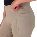 Aubrion Optima young rider tights are created for elite competition performance using modern design technology and innovative fabrics, appealing to riders who demand excellence whilst training or competing. Bringing an ultimate freedom feel, these riding tights are the perfect choice for enhanced in-saddle comfort. Contemporary GX features tonal diamante scattered above the pockets to catch the light with every movement. Cleverly engineered 360º contour support and excellent moisture management revitalise though all levels of activity. A sleek flexible high waisted style offers core support for added confidence. The contour seat has a gloss silicone print for in-saddle security. Neatly finished with a self-colour Aubrion logo at the leg, adding a subtle nod to elevated equestrian design.