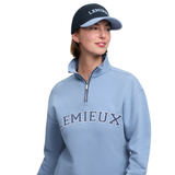 Wind back to the retro trend with this stunning vintage-look cap from LeMieux. With Varsity vibes to match the Kelsie 1/4 Neck sweat, this cap features a colourful twill fabric, vented eyelets and a contrast peak to shade your face.