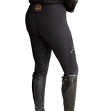 Carefully curated using high-tech sport fabric derived from 77% recycled plastic bottles, these stylish riding tights are designed with performance and comfort in mind. Benefiting from excellent moisture-wicking and anti-bacterial properties and a flattering high waist design, they will contour to your figure, offering a flattering and supportive fit. Featuring a handy phone pocket, no bulk ankles, and a full silicone seat for extra security in the saddle, they are beautifully finished with Supreme Products signature gold detailing.