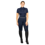 The Hy Equestrian Elevate Heritage Short Sleeve Base Layer seamlessly combines classic equestrian style with modern performance features, making it an ideal choice for riders who value both tradition and functionality. Crafted from a silky soft, four-way stretch fabric, this short sleeve base layer offers exceptional comfort and freedom of movement, whether you're in the saddle or handling daily yard tasks. The breathable material ensures effective moisture-wicking, keeping you dry and comfortable during intense activities. The flatlock stitching provides a smooth, flattering fit, while the quarter-zip neckline adds a touch of sophistication and allows for adjustable ventilation. Whether worn alone in warmer weather or layered under outerwear during cooler months, this versatile piece maintains its shape and style throughout the seasons. Pair it with other items from the Elevate collection for a coordinated and stylish look that embodies both classic and contemporary equestrian fashion.