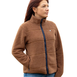 Stay cosy whilst caring for the environment. The stunning Elevate Style Teddy Fleece Jacket is designed using a technical teddy fleece that is made from recycled plastic bottles! This insulating layer traps warm air and creates a snug feeling, ideal for cold winter days on the yard or out in the countryside. Styled to offer a sculpted and contoured fit for a sleek and comfortable look whilst ensuring you stay warm but don’t overheat, the ultimate in temperature control! Detailed with handy zip front pockets and two-way front zip for ultimate practicality.