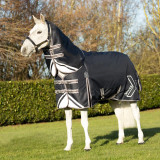 The elite DefenceX Shield turnout rug is a high specification rug that has been expertly crafted from a ballistic 1200 denier waterproof and ripstop material to offer ultimate protection. This 50g rug is perfect for when a lighter layer is needed to protect your horse from the inclement weather. Featuring a snug fit detachable neck with double locking touch tape fastenings for an easy yet secure attachment, that includes an elasticated poll to reduce wind chill and provide a cosy fit. An innovative specially shaped tail flap offers ultimate coverage from rain and wind, detailed with reflective detailing, as well as on the body of the rug and neck to optimise visibility in low light conditions. The mid-rise, generous shoulder gusset allows for a full freedom of movement and padded wither has been expertly designed to guarantee comfort by aiding with alleviating pressure off the wither. The deep cut design is securely fastened with adjustable cross surcingle’s with elasticated inserts and twin buckle clip chest fastenings for stability and to offer the perfect fit. Finished with the choice of wipe clean fillet string and adjustable leg straps, so the rug can be tailored to suit each individual horse.