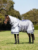 The Kudos AeroGuard Fly Rug is the ultimate technical fly defence. Crafted in ripshield mesh, it's engineered in durable nylon and monofilament polyester for a structure that shapes around your horse's body to protect them from flies. 

The structured yet lightweight ripshield mesh makes this fly rug highly breathable, naturally repelling water and encouraging rapid drying. The extended, shaped belly flap maximises coverage and features a three-strap closure with a detachable central strap that helps to self-right the rug.

The trigger clip front fastening system makes for easy rug changes. Antibacterial and anti-static lined, it's ideal for all-day comfort. Our patented two-part skirt provides a break in the hemline and relieves tension allowing for a greater range of movement.

For the best fit on a 'fuller across the belly' or deeper-chested horse, size up.