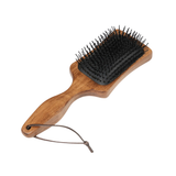 Add a touch of natural luxury to your grooming rituals with this Artisan Mane and Tail Brush. Its ergonomic wooden handle and leather hanging loop make it a cut above the rest, while the cushioned wavy bristles are perfect for detangling manes and tails.

Beautiful gold foil debossed branding adds a touch of sophisticated LeMieux style.