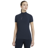 Do it all in this UV50+ quarter zip base layer. Its technical fabric regulates your body temperature, with vented underarms to keep you cool and dry. Contrast matte logo print is a subtle sign of the quality you expect from LeMieux. 

Sweat-wicking, anti-microbial and with 360° stretch for unrestricted comfort, there's nothing this base layer can't do. The silky-smooth fabric, ultra-soft seams and flat lock stitches reduce chafing and keep bulk to a minimum when worn under a fleece, jacket or gilet.

Designed to coordinate with the Classique Collection in the most popular LeMieux colours.