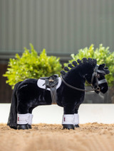 Skye is an elegant black dressage horse with plaitable black mane and tail. Her coat is incredibly soft, perfect for brushing and looking after.

She stands securely on all four legs and is flexible making her safe for young children (3 years +) to play with.

Skye comes in her own posh horse box that turns inside out to become a luxury stable!

Of course, additional matching accessories are available for Skye in your favourite colours including saddle pads, fly hoods and polo bandages as well as fully working saddles and bridles in real leather, making these toys not only great fun to play with but educational too!

Every pony is individually hand made, varying slightly in size and shape, and comes with it's own passport and instructive care booklet.