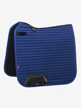 Range of plain squares that is anything but plain! Designed for the active horse, offering style, durability and maximum fabric performance. A number of innovative design features have been incorporated in this a fantastic pad.

New super soft Bamboo lining absorbs & controls sweat under the saddle, making it beautifully comfortable and secure - minimising friction.
Girth straps with optional inner locking loop to prevent slipping
D-Ring straps contoured to give better fit and allow breast plate attachments
High wither swan neck design for freedom at the wither.
Signature girth protection area for added strength.


These top end designed pads are ideal for everyday or competition use. They also look great when combined with a Lemieux Half Pad creating a very smart look.