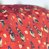The StormX Original 50 Turnout Rug is perfect for when your horse needs protection from the rain. This rug features classic Thelwell cartoon characters on a red background and is complimented by a navy drip strip. The 600 denier waterproof, yet breathable, outer fabric will protect your horse from the elements and the 50g fill makes this the perfect layer. Featuring twin adjustable buckle chest fastenings, fleece lined wither area to prevent rubbing, adjustable cross surcingles that feature an embroidered Thelwell logo, adjustable leg straps and a generous tail flap.
