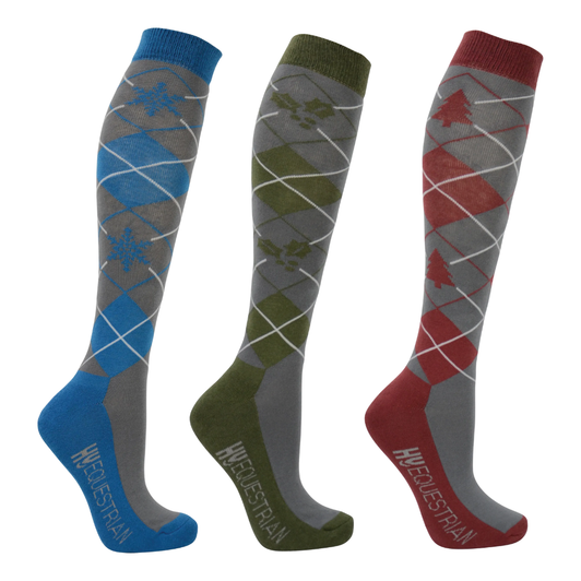 The perfect Christmas present for your horsey friend or yourself, the Hy Equestrian Christmas Argyle Riding Socks feature the timeless design that equestrians love, with a festive twist. This three-pack of soft and stretchy long horse riding socks are made with antibacterial, moisture-wicking bamboo fibre with padded soles to keep your feet and calves warm, dry and comfortable. With Christmas tree, snowflake and holly designs, wear these stylish equestrian socks in their pairs, or mix and match for a touch of individuality. Available in Slate Grey with Green, Blue and Red. The perfect Christmas present for your horsey friend or yourself, the Hy Equestrian Christmas Argyle Riding Socks feature the timeless design that equestrians love, with a festive twist. This three-pack of soft and stretchy long horse riding socks are made with antibacterial, moisture-wicking bamboo fibre with padded soles to keep your feet and calves warm, dry and comfortable. With Christmas tree, snowflake and holly designs, wear these stylish equestrian socks in their pairs, or mix and match for a touch of individuality. Available in Slate Grey with Green, Blue and Red.