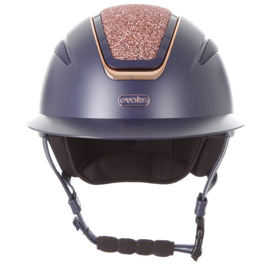 Introducing the show stopping Callisto Wide peaked riding helmet in a stand-out deep matt navy finish with highshine navy & rose gold vent, beautiful rose gold crystal centre panel, and matching rose gold & navy evoke branding. A pinnacle of style, safety and sophistication.
 

Conforms to PAS 015: 2011 Standard; EN 1384 2023
Kitemarked to PAS 015: 2011
CE & UKCA marked
Lightweight ABS peaked helmet* with triple ventilation
Soft touch four-point adjustable leatherette harness
Individual centimetre sizing