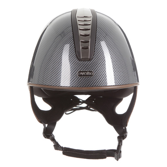 Introducing the stellar Orion Jockey Skull. Sporting a high shine carbon paint finish, gunmetal and black vent and contrasting elegant tan harness. A gunmetal ‘evoke’ branded logo at the forehead completes the look.
  
Conforms to PAS 015: 2011 Standard; EN 1384 2023; ASTM F1163-23

Kitemarked to PAS 015: 2011
CE & UKCA marked
Lightweight ABS jockey Skull
Fully ventilated with stylised contrast panels and reinforcement mesh

Soft touch four-point adjustable leatherette harness with rear lacing