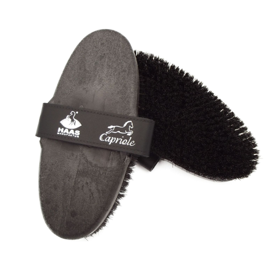 The Capriole is a brush that is great to use for everyday brushing. Made from black horse hair, this brush is great for removing dirt from the top of the coat.