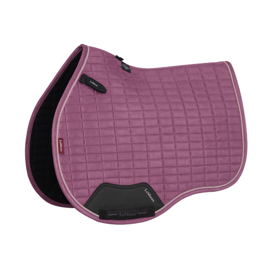 The classic General Purpose Square is designed to fit a range of GP saddles. New athletic block quilting pattern with contrast piping offers optimum streamlined cushioning.

An iconic GP pad with its high wither cut, elasticated D-ring tabs and swept back profile, our suede saddle pads offer practicality and comfort under the saddle.

The luxurious yet easy-care suede-effect upper is perfect for everyday occasions, while contoured suede-effect binding prevents mis-shaping. The breathable, anti-static, antimicrobial and quick drying bamboo blend lining absorbs and controls sweat under the saddle. It's also beautifully comfortable and secure, minimising friction even on sensitive-skinned horses.

An updated durable girth protection area with a low-key matte finish ensures lasting quality. Girth keepers incorporate inner looped channels to offer more girthing options.