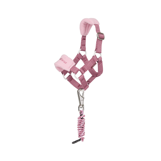 A perfect toy version of the LeMieux Vogue Headcollar. It includes a fleece-padded noseband and headpiece with intricate LeMieux embroidered branding, an adjustable strap and even a matching leadrope, just like the real thing! And it also comes in a rainbow of mixy matchy colours.Now your LeMieux Toy Pony can look stunning in a full mix-matchy or matchy-matchy outfit.Suitable for ages 3+