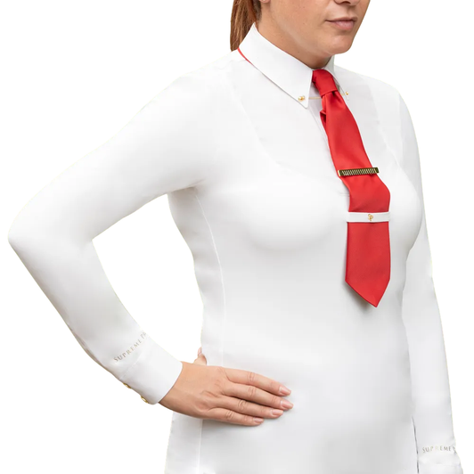 This beautifully crafted and meticulously designed long-sleeved show shirt not only offers the perfect fit but also benefits from a buttery soft material with advanced breathability, four-way stretch, and anti-UV (50+) properties. Tailored to perfection, it features a stiff, crisp collar with pin holes and slimline cuffs for the picture-perfect look when worn under a competition jacket. Quick-drying and easy to care for, it is the perfect addition to your competition wardrobe. Beautifully finished with subtle and elegant signature Supreme Products gold branding, this truly luxurious competition shirt will help you perform and feel your best on show day.