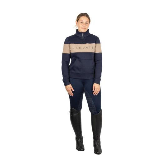 The Hy Equestrian Elevate Style Sweatshirt will become a wardrobe staple! This modernly styled sweatshirt is designed to keep you warm and comfortable on cooler days. Made from a soft cotton blend, it features a brushed fleece lining and moisture-wicking fabric to maintain the perfect balance between warmth and breathability. The colour block design creates an on-trend style for the fashion-conscious equestrian and looks perfect when paired with riding tights for active days at the yard or with jeans for casual days exploring the countryside.