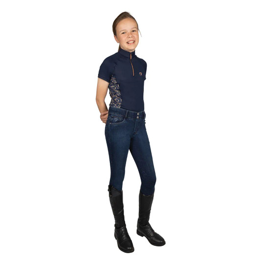 The Hy Equestrian Elevate Heritage Short Sleeve Base Layer seamlessly combines classic equestrian style with modern performance features, making it an ideal choice for riders who value both tradition and functionality. Crafted from a silky soft, four-way stretch fabric, this short sleeve base layer offers exceptional comfort and freedom of movement, whether you're in the saddle or handling daily yard tasks. The breathable material ensures effective moisture-wicking, keeping you dry and comfortable during intense activities. The flatlock stitching provides a smooth, flattering fit, while the quarter-zip neckline adds a touch of sophistication and allows for adjustable ventilation. Whether worn alone in warmer weather or layered under outerwear during cooler months, this versatile piece maintains its shape and style throughout the seasons. Pair it with other items from the Elevate collection for a coordinated and stylish look that embodies both classic and contemporary equestrian fashion.