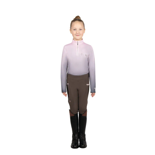 Create a fashionable style with the Lucky Pony Base Layer! This stunning base layer is made from an ombre pink and grey four way stretch fabric, for a flexible and comfortable fit all day long. Featuring a silver half zip with tonal detailing for ease of dressing and embroidered, diamante and silicone print emblems for a special style. Coordinates perfectly with the Lucky Pony collection for a beautiful matchy matchy look!