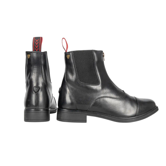 Designed using a premium aqua repellent leather, the new ProPriverno Zip Jodhpur Boots are a sleek and stylish choice for the active equestrian. The specially shaped elastretch panels help the ankle joint move freely without compromise whilst remaining supportive and the HyX-line zipped front with emblem zip pull make these boots easy to put on and take off. Innovatively placed stitched panels not only look good but create a streamlined, comfortable and supportive boot. The specially crafted ADVANCED CUSHION TECHNOLOGY (ACT) sole has been specially engineered to offer unrivalled reinforcement, comfort, balance, grip and breathability, bringing together the latest textiles and technology for optimal performance. Comprised of five unique layers to create the ultimate capillary action and anti-shock foundation for the foot. Finished with rubber spur rest and pull tab to complete the classic jodhpur boot look.
