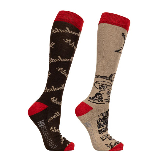 Brighten up your riding wardrobe with the Hy Equestrian Thelwell Collection Comic Chaos Socks – the perfect mix of comfort, character, and classic Thelwell humour. This fun twin pack features two lively designs in taupe and red, each showcasing the beloved Comic Chaos artwork that young riders (and Thelwell fans of all ages) will adore. Made with a soft, breathable bamboo fabric blend, these socks offer all-day comfort whether you're in the saddle or at the stables. The cushioned sole provides extra support during long days on your feet, while the stretchy, snug fit ensures they stay in place under boots or half chaps.