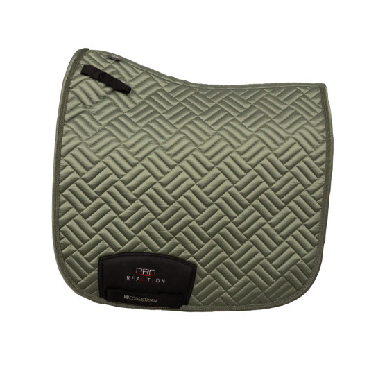 Where performance meets elegant style. The ProReaction Recherché Saddle Pad is designed using a satin silk touch outer with unique roman square quilting, offering a deluxe feel and look for any occasion. With a technical mesh lining to allow for optimum moisture wicking and comfort, the pad also offers the signature Hy Equestrian cut over providing clearance over the withers and spine. Featuring sturdy anti-rub girth cover protection, double touch tape strap girth loops and D-ring fastenings for a secure and precise fit.