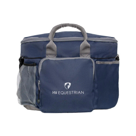 A smart navy bag to keep your grooming essentials neat and tidy. This sturdy bag has plenty of space and comes with six open pockets that are perfect to hold all your lotions and potions. Inside the bag features an easy-to-clean lining, alongside a zip pocket with a name identifier and a space for your valuables. The bag is finished with a reinforced base and studs to prevent damage and a Hy Equestrian logo embroidered on the front.