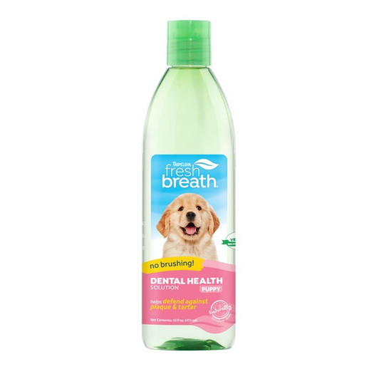 Cleaning a puppy's teeth is about more than just getting their pearly whites to sparkle – it’s an important step in their overall health and wellness. With TropiClean Fresh Breath Dental Health Solution for Puppies, puppies can benefit from daily plaque and tartar defense, simply by drinking from their water bowl. Easy-to-use Dental Health Solution gives the puppy clean teeth and fresh breath—no brushing required!

Helps Defend Against Plaque & Tartar — Formulated with a unique blend of ingredients for clean teeth and a healthy mouth.

Freshens Breath — Goodbye dog breath, hello fresh breath! See fresher breath in 14 days or less with daily use as directed. Results may vary.

Tasteless — Contains no added flavours, making it easy to incorporate into a dog's daily routine.

Start Puppy on the Right Paw — Getting puppy on an oral care routine early on can help dogs have a healthier, happier mouth as they grow.

More Than Just Clean Teeth — Did you know? — Establishing a daily oral care routine helps protect pets against the harmful side effects of periodontal disease, which can impact the liver, heart, and kidneys.

How to Use — Add 1/2 capful (5ml) of Dental Health Solution for Puppies to 8 oz (1 cup) of water twice daily. No brushing required!

Family Owned — TropiClean products are proudly made in the U.S.A by pet lovers like you.

For use in dogs only, 12 weeks and older.