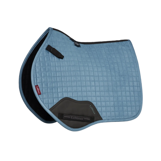 Designed for enthusiastic mini riders, the Mini Close Contact Square Saddle Pad combines quality, comfort and style to ensure the perfect fit on ponies from 11.2-13hh.

The Mini CC Square has a soft yet durable suede outer fabric, breathable mesh lining that wicks sweat and moisture, and a strengthened girth protection area.

The hidden girth strap loops keep the pad secure and stable while the signature branding gives this pad a beautifully fun finishing touch.