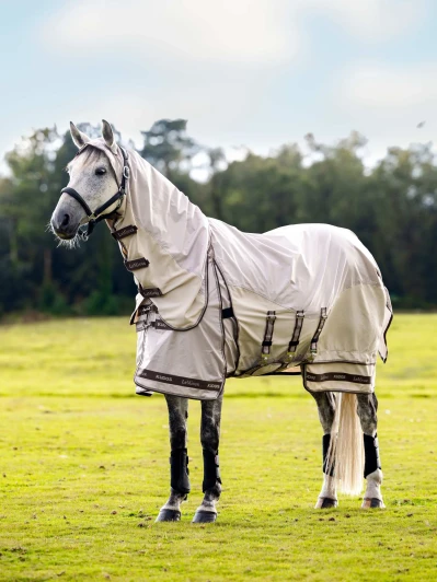 Designed with sweet itch protection in mind, it features extra poll, wither and top-of-tail protection, a waterproof topline and a breathable lightweight skirt with full coverage under the belly.

3D mesh wither padding delivers comfort and breathability, while anti-static and anti-bacterial lining on the back, shoulders and neck prevents rubbing and enhances shine.

The full neck, which secures over the ears, is attached for bug-proof protection and cover. The extra long tail flap protects the sensitive tail and dock areas.

Adjustable stainless steel double trigger clip fastenings on the front chest allow for extra adjustability over the shoulders.