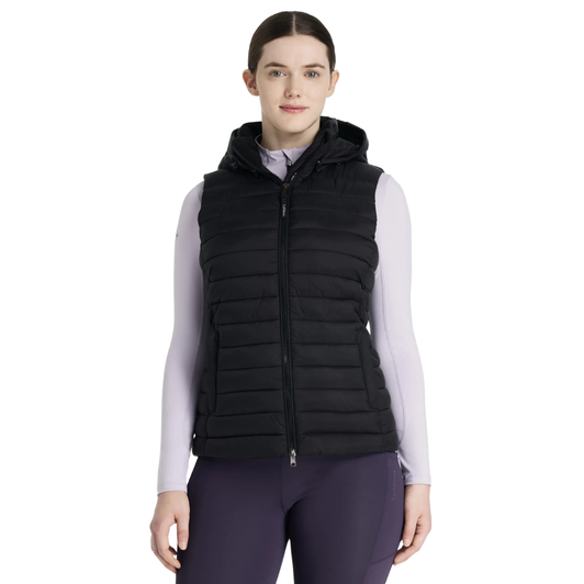 Do it all in this classic lightweight water-resistant puffer gilet. In a step towards sustainability, it's filled with recycled Repreve® down quilting, which is light and warm with a lovely loft for lasting puffiness.

Be prepared for unpredictable, chilly days with this water-resistant gilet. Its detachable and adjustable quilted hood provides versatility, allowing you to adapt to changing weather conditions. The luxurious metal finishings are a testament to the excellent quality you can expect from LeMieux.

The durable two-way front zip is great for riding and prevents scratches to your pommel. A flattering and stylish cut, zipped pockets, and subtle LeMieux branding make this jacket a must-have for all your activities, whether it's riding, doing jobs around the yard or running errands.