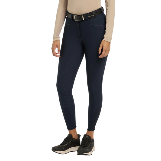 Technically designed, these sleek breeches combine equestrian-led design with smart looks for an advanced ride.

Smart square front pockets with tonal reflective details, a seamless-feel design, and a soft and flexible four-way adaptive stretch keep you moving in comfort. Belt loops, faux back pockets, and a fly front are classic breech styling details. Offered in full seat and knee grip styles, they deliver stability and security in the saddle, according to your preference.

Anatomic leg panels reduce bulk under your boots for a close contact feel, while the seamfree inside leg means that nothing will get in the way between you and your best ride yet.