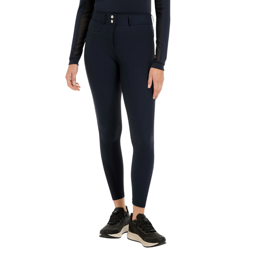 Technically designed, these sleek breeches combine equestrian-led design with smart looks for an advanced ride.

Smart square front pockets with tonal reflective details, a seamless-feel design, and a soft and flexible four-way adaptive stretch keep you moving in comfort. Belt loops, faux back pockets, and a fly front are classic breech styling details. Offered in full seat and knee grip styles, they deliver stability and security in the saddle, according to your preference.

Anatomic leg panels reduce bulk under your boots for a close contact feel, while the seamfree inside leg means that nothing will get in the way between you and your best ride yet.