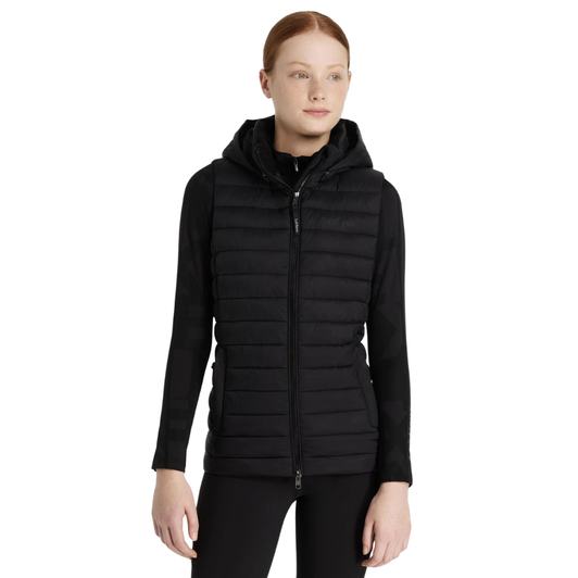 Do it all in this classic lightweight, water-resistant puffer gilet. In a step towards sustainability, it's filled with recycled quilting, which is light and warm with a lovely loft for lasting puffiness.

Be prepared for unpredictable, chilly days with a throw-on gilet, perfect for layering over hoodies or under coats. Its detachable quilted hood provides versatility, allowing you to adapt to changing weather conditions. The luxurious metal finishings are a testament to the excellent quality you can expect from LeMieux.

The durable two-way front zip is great for riding and prevents scratches to your pommel. A flattering and stylish cut, zipped pockets and subtle LeMieux branding make this jacket every young rider's must-have for riding, around the yard and the school run.