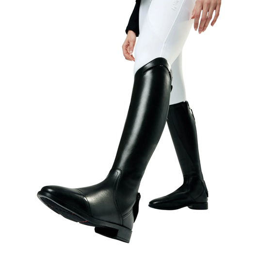 Experience the pinnacle of footwear expertise and equestrian-led design, with an elegant yet subtle diamante stone channel topline detail and smooth front profile. Each detail of these elegant ‘fit and flex’ full grain premium leather riding boots is crafted for support and comfort in every equestrian discipline.

High-grade, durable elastic calf gussets offer a close fit.. A durable YKK zip runs from the back of the heel to the top of the calf behind the knee. A concealed zip keeper and sturdy zip puller make pulling on and taking off easy. A clever neoprene-cushioned cover prevents discomfort behind the knee. An integrated spur rest is mounted on the engineered zip protector flap, giving a contemporary touch.

The X-Grip rubber sole provides non-slip traction in every weather, with a carefully designed linear tread pattern that interacts with your stirrup footplate grip, for maximum foot security in the stirrup.

Inside, the comfortable 5-density contoured ergonomic footbed provides total support and stability for the entire sole of your foot. A breathable high-grade full leather lining and heel tongue is designed to deliver all-day comfort for hardworking feet and legs.

An elegant silhouette that offers all-day comfort, foot stability, lower leg support and all-weather grip for riders who want to achieve their best performance.
