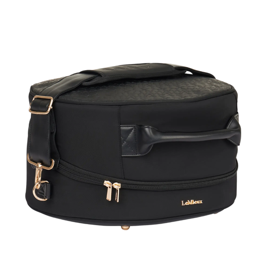 This luxurious hat box is perfect for storage at the yard or travelling to clinics and shows. The super soft quilted faux fur lining keeps your hat clean and protected.

Designed for elegance and practicality, there's a detachable shoulder strap and comfortable rolled faux leather handle.

An internal air-vented compartment stores your gloves, with an additional pocket for hair nets and accessories. The large double zip clam shell opening offers easy access.

The Luxe Hat Box coordinates with the Luxe Luggage range, ideal for competitive riders.