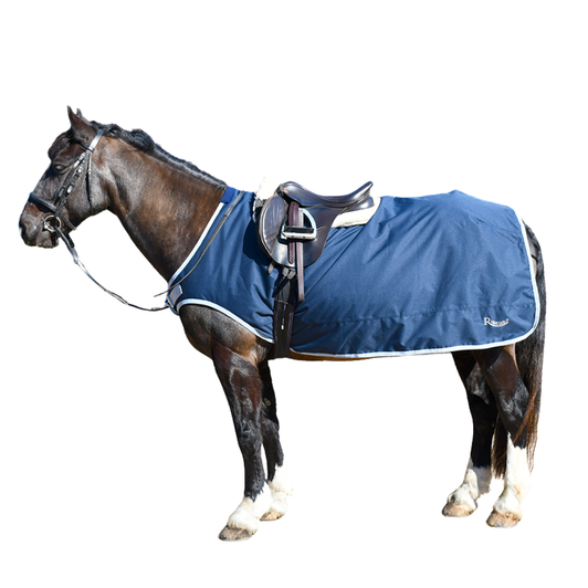 These 3/4 ride-on rugs are made from a durable, waterproof fabric, fully fleece lined for warmth. They feature a cutaway shoulder design to allow freedom of movement and ensure maximum comfort for the horse while in use. A soft fleece wither pad helps reduce pressure and prevent rubbing at this sensitive area.

Designed to provide additional warmth, these rugs are ideal for use at the showground or when hacking , particularly for clipped horses, helping to keep the winter chill off their backs and promote a calmer, more comfortable ride.

The rug is designed to sit neatly underneath the saddle and features a single chest buckle for secure fastening. Supplied complete with a fillet string.

Showerproof breathable outer material with an easy clean nylon lining.