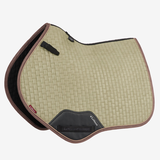 Now with a New Super Soft Suede Binding and New PU Leather Girth Protection area, the classic Close-Contact cut from LeMieux is designed to fit a wide range of more forward cut jumping saddles. Now one of the most iconic jumping pads with its high wither, elasticated D-Ring tabs and swept back profile . These saddle pads offer a very sleek and professional look to anyone's saddle. The luxurious suede top side and new soft suede binding is complimented by super soft Bamboo lining which absorbs & controls sweat under the saddle and is beautifully comfortable and secure - minimising friction even on sensitive skinned horses. Girth keepers incorporate inner locking loops to offer more girthing options.