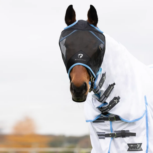 This fly mask will protect your horse or pony against flying insects. Featuring eye darts to offer good clearance off the eyes and a fleece panel on the brow area, this fly mask won’t rub the face and will be comfortable to wear all day long. The touch tape fastenings secure the mask and make it easy to put on and take off and the ‘no ears’ design mean that it is suitable for horses that have ears that are sensitive to touch. This fly mask will protect your horse or pony against flying insects. Featuring eye darts to offer good clearance off the eyes and a fleece panel on the brow area, this fly mask won’t rub the face and will be comfortable to wear all day long. The touch tape fastenings secure the mask and make it easy to put on and take off and the ‘no ears’ design mean that it is suitable for horses that have ears that are sensitive to touch.
