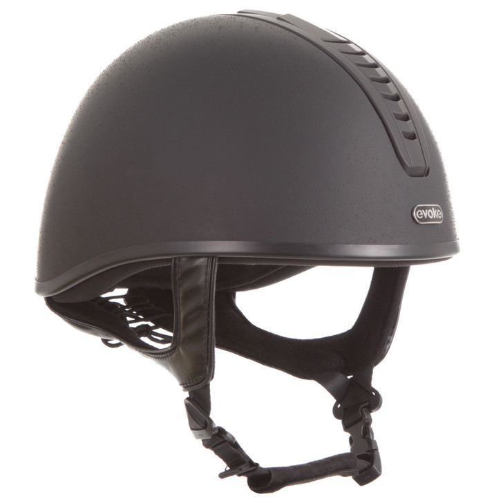 Introducing the jockey skull, the Orion JS4K. Available in a stylish, all-black sanded design, the Orion JS4K is the ultimate choice for children looking for a safe, comfortable, and affordable jockey skull. The chrome ‘evoke’ logo finishes the look and is sure to look good with any colour hat silk.

Suitable for all equestrian disciplines including cross country.

Conforms to PAS 015: 2011 Standard; EN 1384 2023; ASTM F1163-23

Kitemarked to PAS 015: 2011
CE & UKCA marked
Lightweight ABS jockey Skull
Fully ventilated with stylised contrast panels and reinforcement mesh

Soft touch four-point adjustable leatherette harness with rear lacing