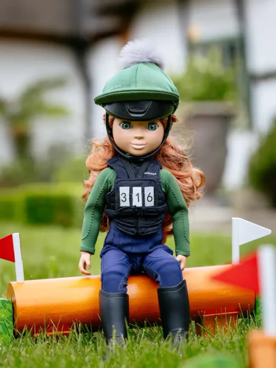 Get ready for Eventing! Now your Toy Rider can take on the biggest and wildest XC courses in this realistic body protector and number bib set.

The body protector features hook and loop closures, just like the real thing, while the number bib has interchangeable numbers for realistic play.

LeMieux toys help little equestrians create authentic scenes for absorbing and imaginative play.

Suitable for ages 3+