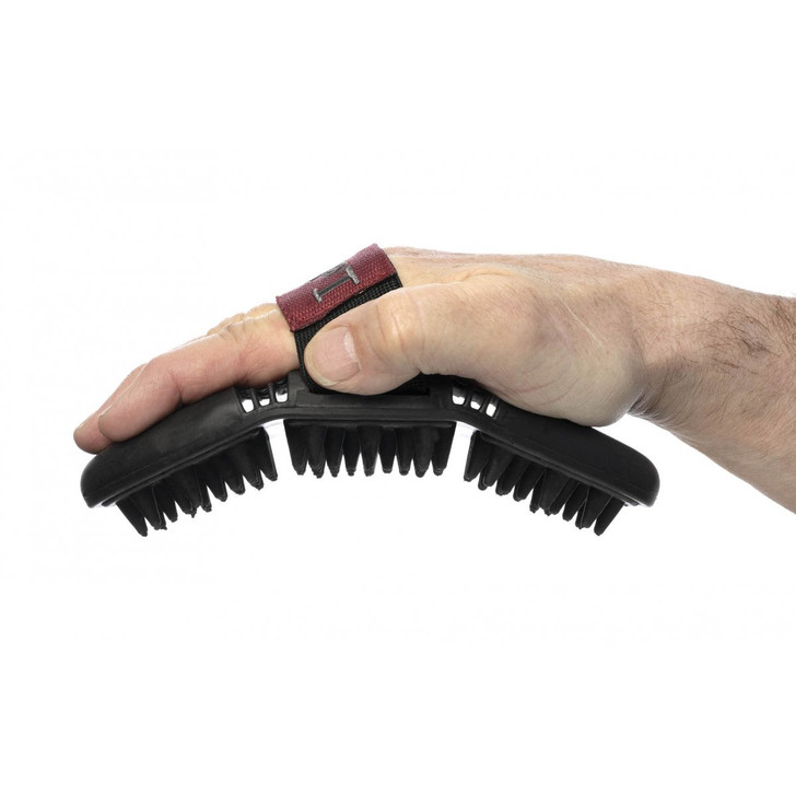 Treat your horse to some TLC with the LeMieux Flexi Massage Comb. The soft rubber nodules not only feel great but can stimulate circulation and provide a deep clean, getting rid of loose hair, dust and dirt. The flexible shape allows reach over almost every part of the horse’s body.

The ergonomic shape fits into the hand perfectly which reduces wrist strain and gripping effort on the brush, while an elasticated strap allows for the perfect fit.