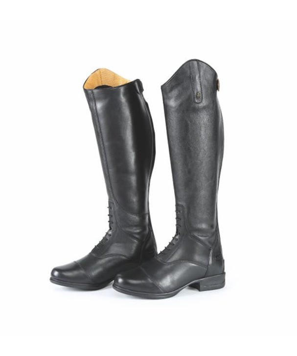 The Gianna field riding boots add a polished, professional touch to your riding. A close leg fit is achieved by pairing hard wearing leather inner calves with softer stretch outer panels that hug the leg. Stretch mock lace detail. Dressage cut tops with soft piqued leather inners. YKK zips. Wicking linings for acclimatised feet. ActiveFit insole with Impact Support System. Moretta shock absorbing rubber soles with steel shanks.