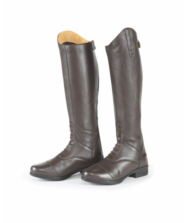The Gianna field riding boots add a polished, professional touch to your riding. A close leg fit is achieved by pairing hard wearing leather inner calves with softer stretch outer panels that hug the leg. Stretch mock lace detail. Dressage cut tops with soft piqued leather inners. YKK zips. Wicking linings for acclimatised feet. ActiveFit insole with Impact Support System. Moretta shock absorbing rubber soles with steel shanks.