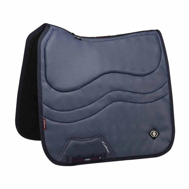 Without doubt the most breathable and lightweight saddle pad from the LeMieux collection. Multi layered micro-mesh gives a high compression factor offering shock absorption without the bulk. An additional layer of blast foam is integrated into the 3D mesh covering the weight bearing areas under the saddle meaning a half-pad is not required. This reduces the layering and therefore heat build-up under the saddle.