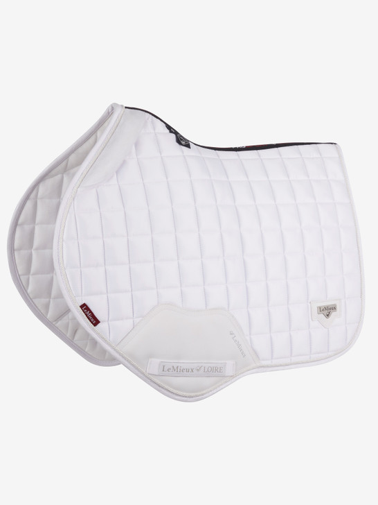 Described as the most stylish saddle pad LeMieux have ever produced. The Loire collection exudes sophistication and class - showing style without showing off! Woven Satin fabric gives a beautiful sheen to these pads whilst still benefitting from the wonderfully soft and breathable Bamboo lining.

The 100% natural Bamboo material controls heat & sweat and wicks very efficiently. The whole pad benefits from a new extensively researched soft friction-free suede binding which is specially fabricated to smoothly contour the edges. This new technique helps retain the perfect saddle pad shape and binding profile.

The textured pu leather girth protection area is complimented by an embossed logo and carries the usual signature LeMieux lower girth strap with its inner locking loops. The piece de resistance of the Loire Close Contact Square is its unique metal badge on a leather mount in the lower back corner.