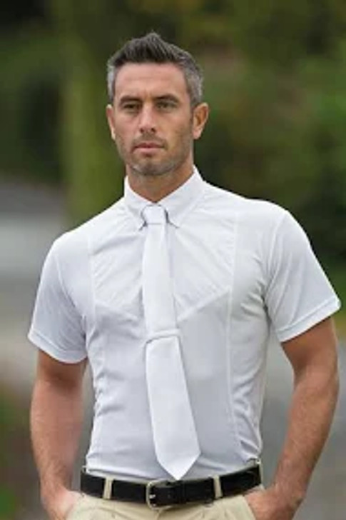 A technical riding shirt that looks smart and keeps you feeling comfortable. Style detail: smart cotton front panel, button down collar, tie keeper, button cuffs, stretch shirt, AIR DRI moisture technology fabric, Aubrion prints.