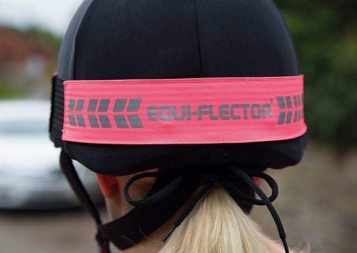 Bright fabrics and reflective strips to add visibility when out riding. A rubberised strap and elastic insert helps to keep it securely in place.